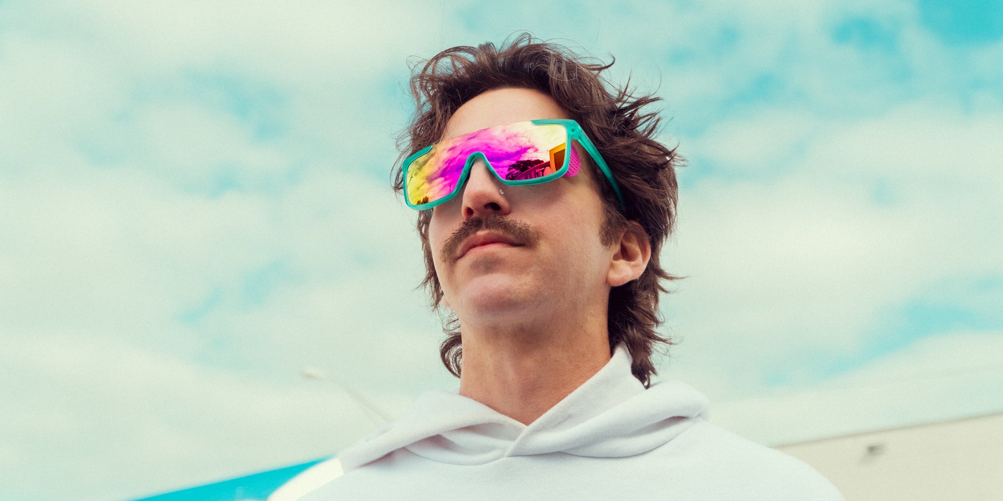 T.D.K. teal oval polarized sunglasses from Neven Eyewear.
