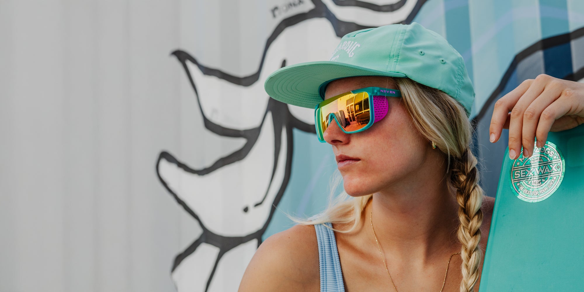 T.D.K. teal oval polarized sunglasses from Neven Eyewear.