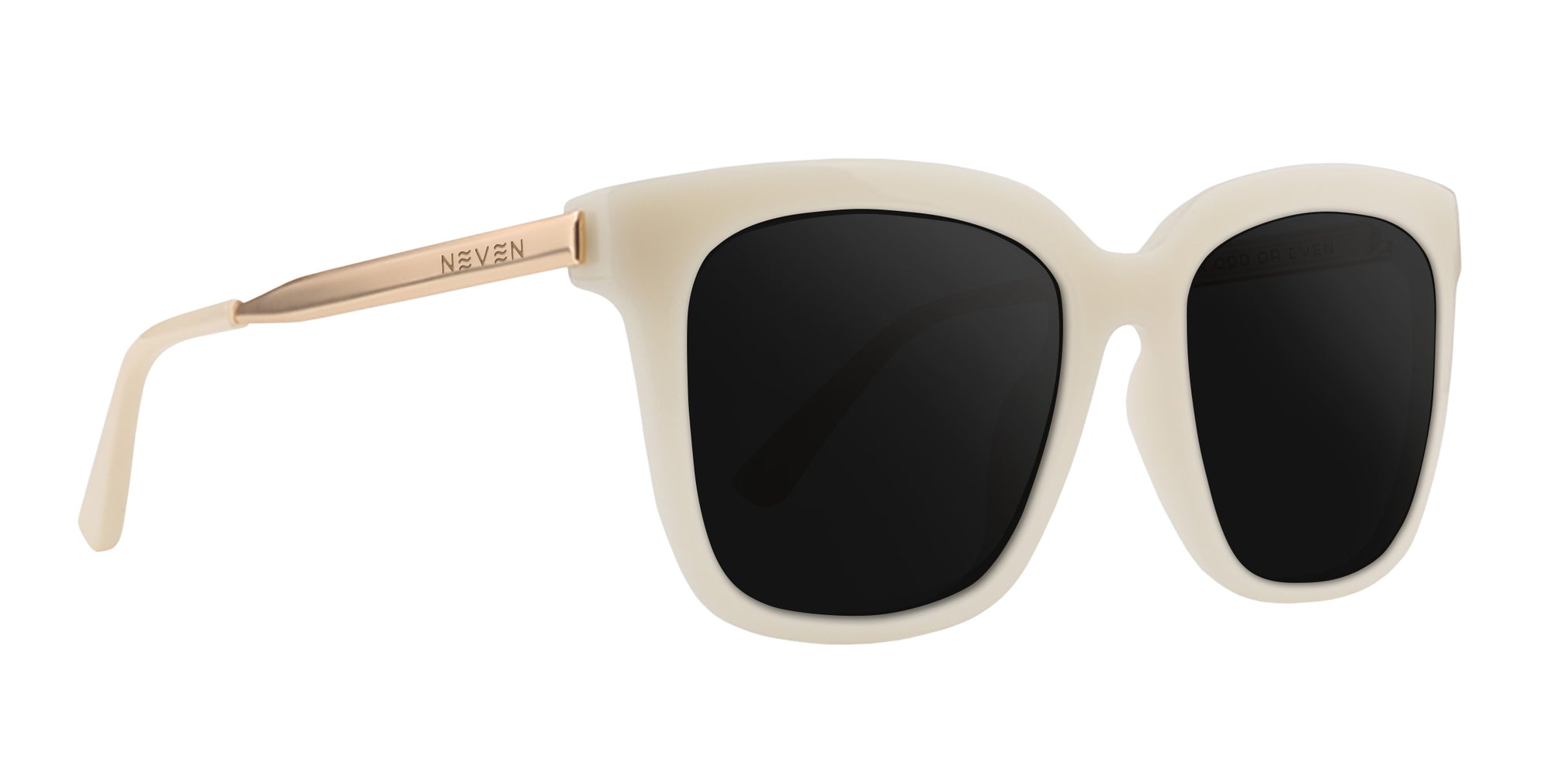 Sand Dollar square prescription glasses in cream color with black lenses.