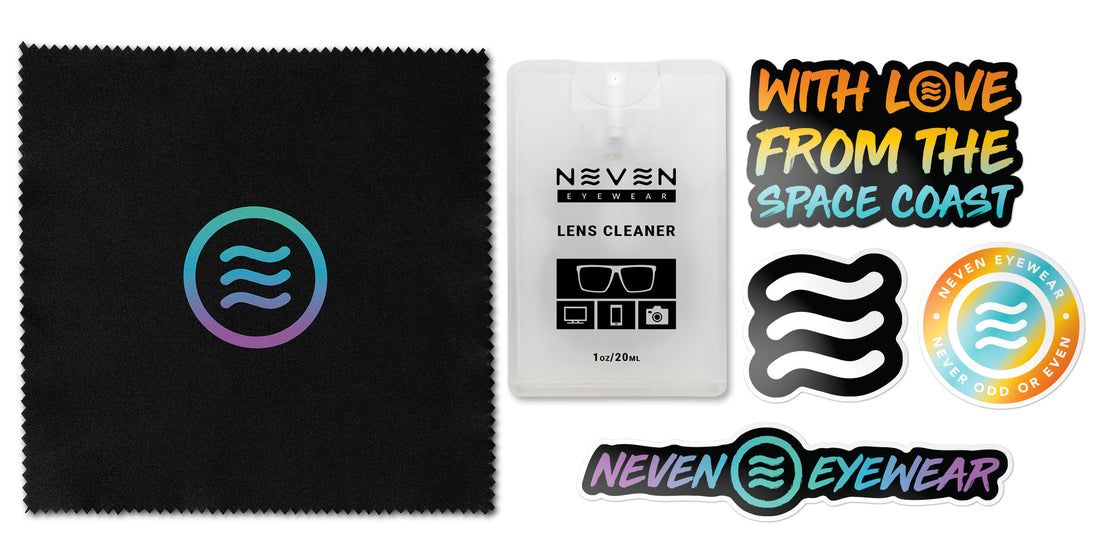 Laydown view of Card Cleaning Kit with 20ml card lens cleaner, black Neven microfiber cloth and four stickers