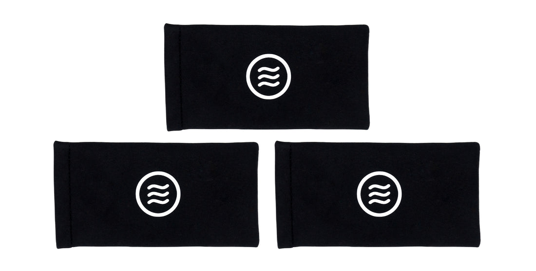Laydown view of 3 Pack Quick Close Case showing white Neven tilde logo on each black case