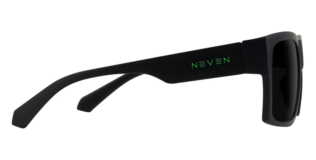 Side view of Dopamine prescription sunglasses showcasing black frames and dark lenses with a white background