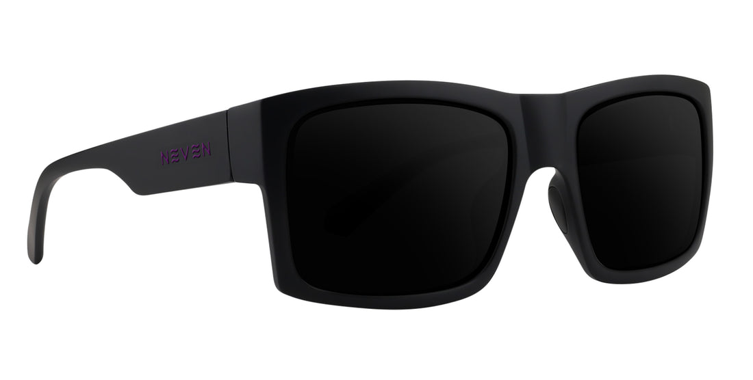 Three-quarter view of Purple Reign prescription sunglasses showcasing black rectangular frames and dark lenses on a white background