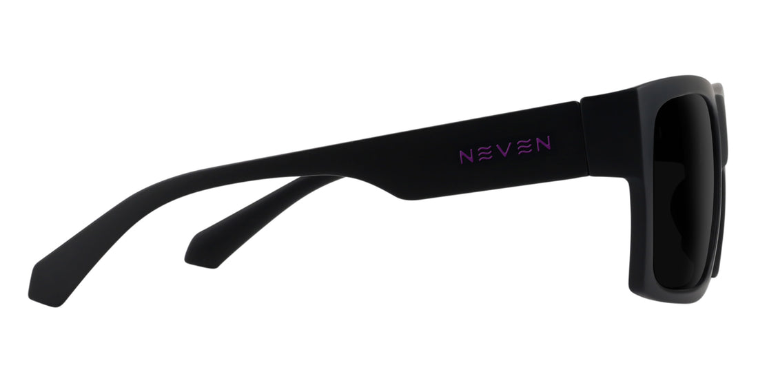 Side view of Purple Reign prescription sunglasses showcasing black frames and dark lenses on a white background