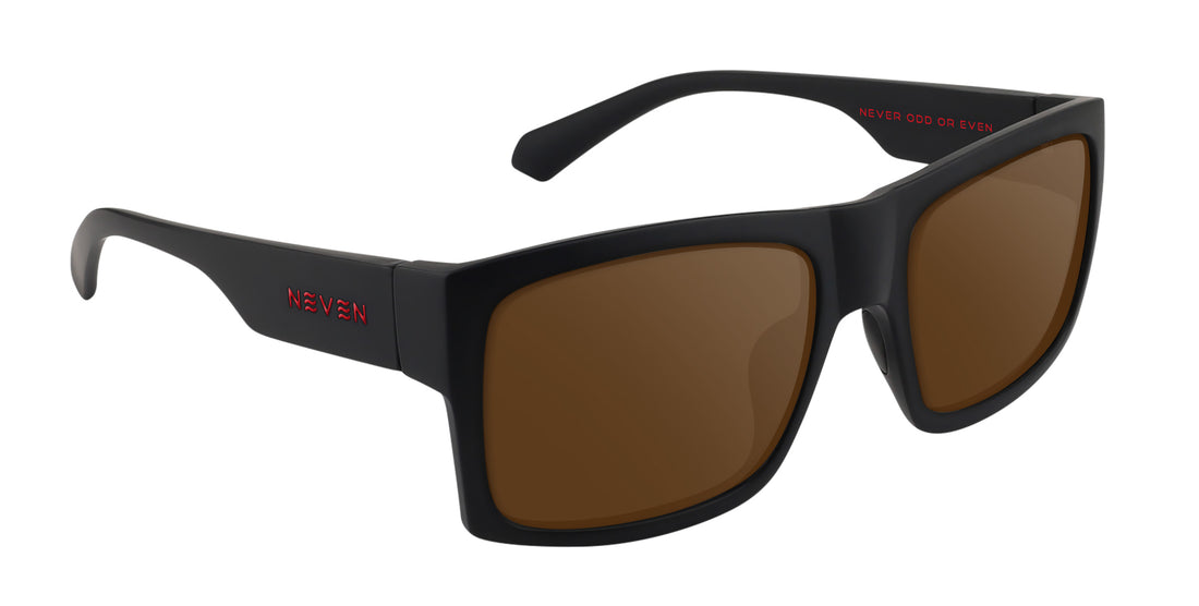 Three-quarter view of Redrum prescription sunglasses showcasing matte black rectangular frame, brown lenses, and red accents