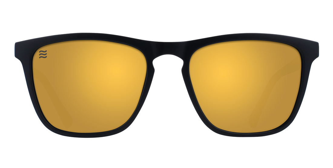 Front view of Liquid Gold sunglasses showcasing black rectangular frames and gold lenses on white background