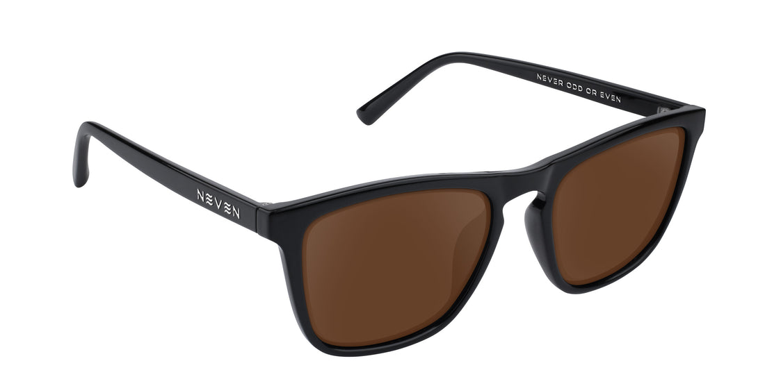 Right three-quarter view of Nix prescription sunglasses with black rectangular frames and brown lenses on white background
