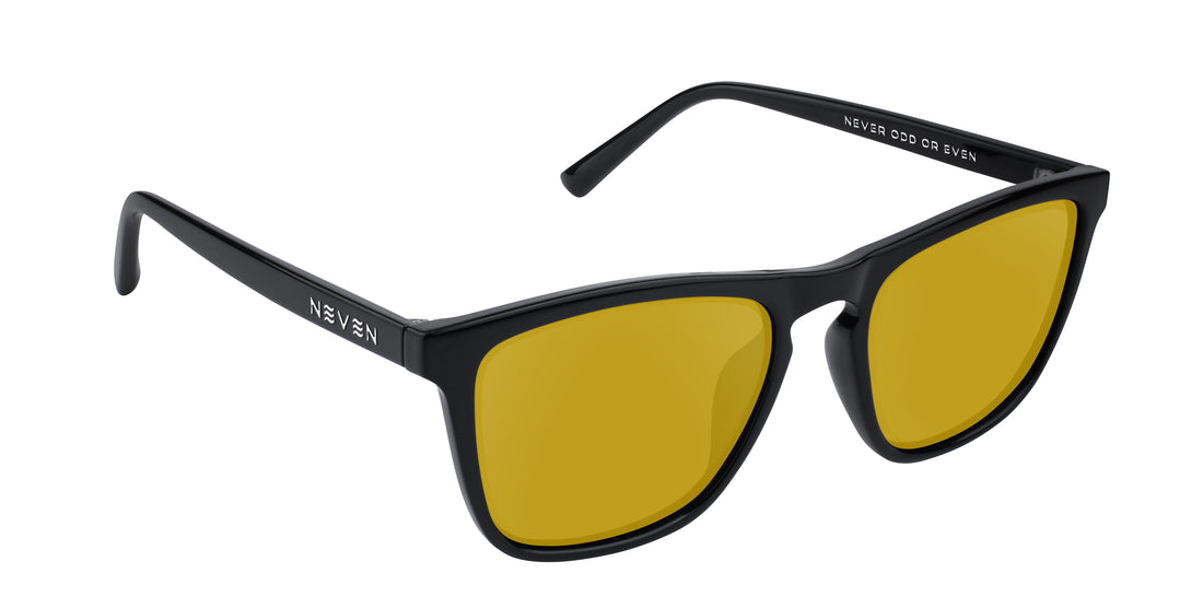 Three-quarter view of Nix sunglasses showcasing black rectangular frames and yellow prescription lenses on a white background