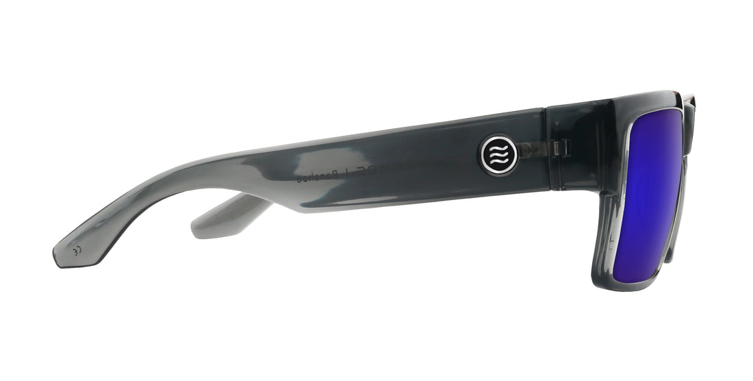Side view of Banshee prescription sunglasses with transparent gray frame, metal hinge and purple mirror lens on white