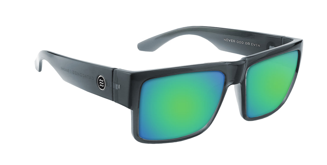 Angled view of Banshee prescription sunglasses with transparent gray glossy frame and green mirrored lenses on white background