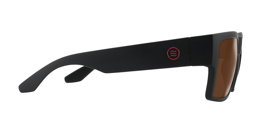Right-side close-up of Havoc sunglasses showing matte black wide temple, red circular logo and brown prescription lens on white background