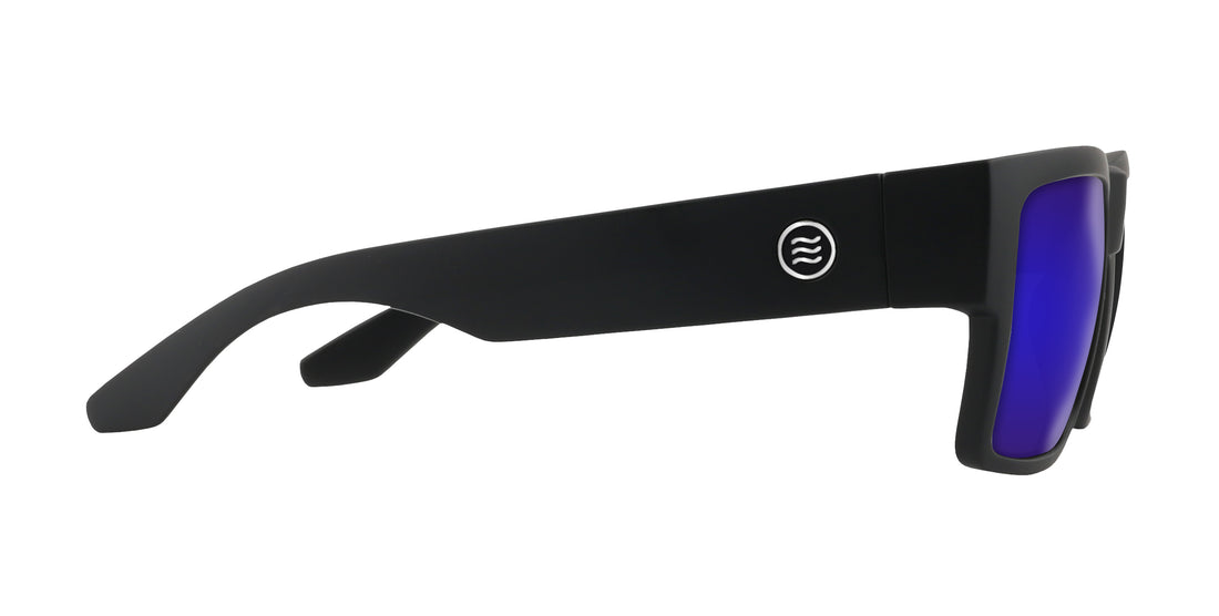 Side view of Relic sunglasses with matte black temple, silver logo and purple mirrored lens on white background