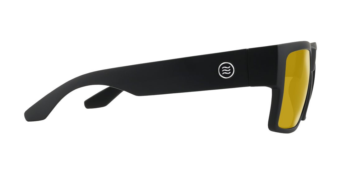 Side view of Relic prescription sunglasses showing matte black frame, yellow lenses, and temple logo on white background