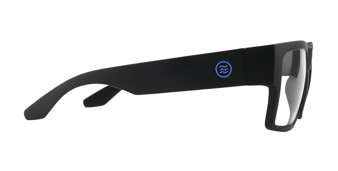 Side view of Scythe prescription glasses showing matte black wide temple, blue circular logo and clear lenses on white background