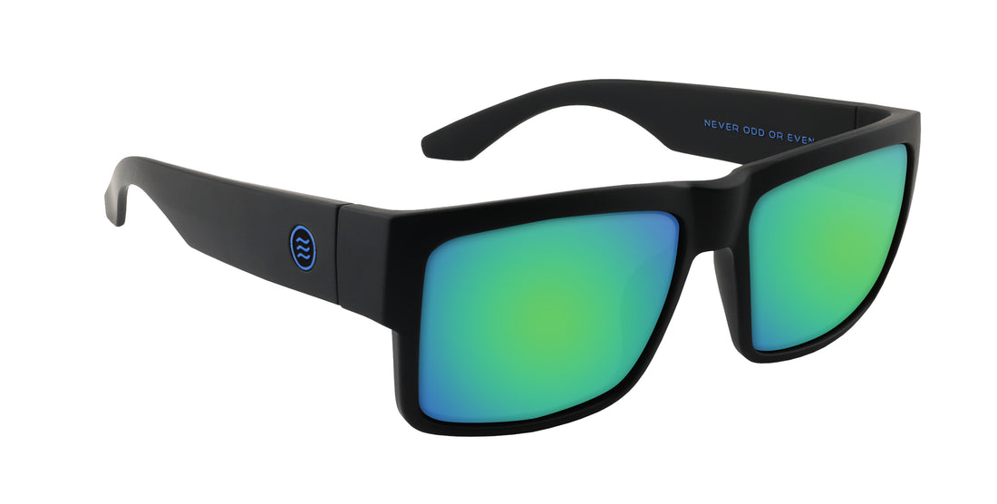 Angled closeup of Scythe prescription sunglasses with matte black frame, green mirrored lenses and blue temple logo on white