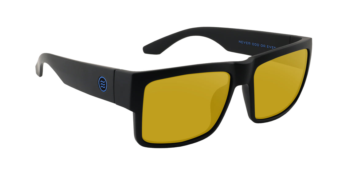 Three-quarter view of Scythe Rx sunglasses showcasing matte black X-Large frame with yellow lenses on white background