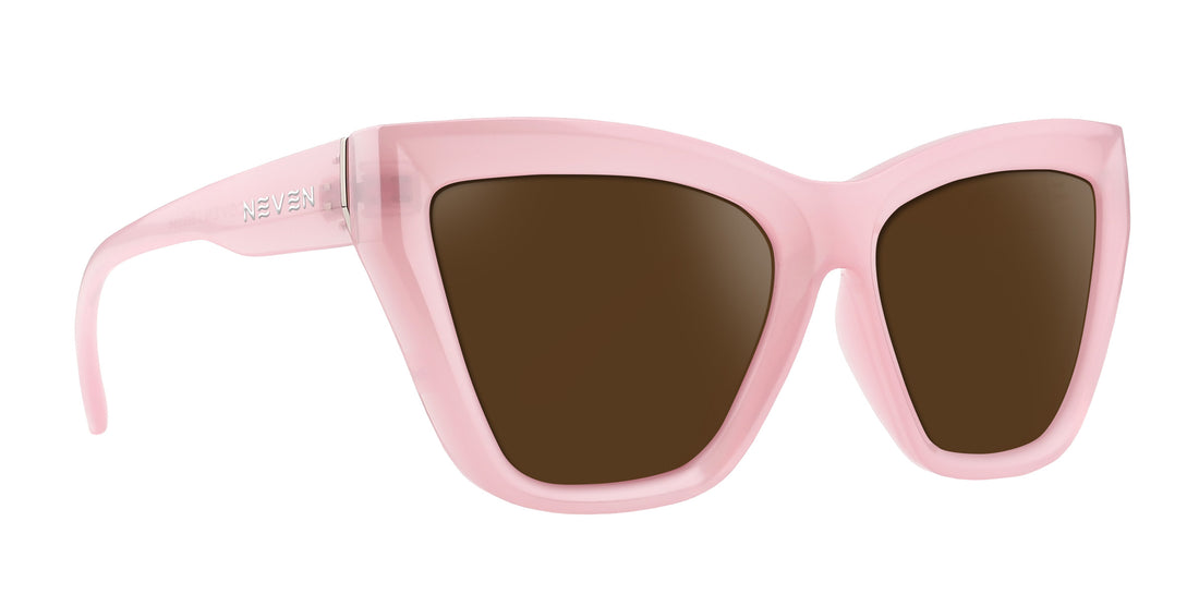 Eclipse pink cat-eye prescription glasses with brown lenses .