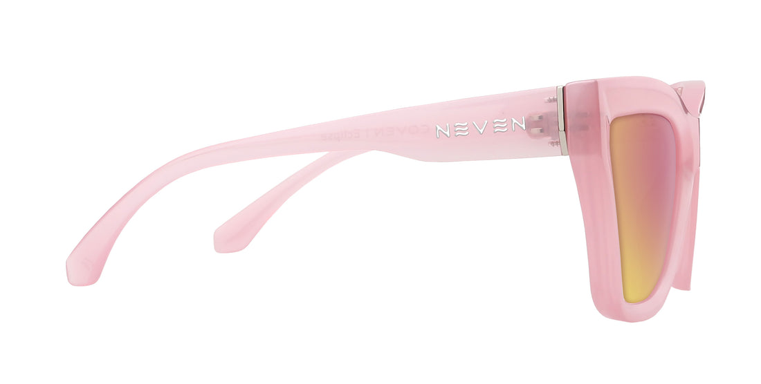 Side close-up of Eclipse cat-eye prescription sunglasses showcasing semi-transparent pink frame and Neven logo on temple
