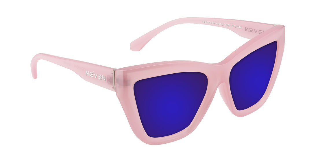 Three-quarter view of Eclipse sunglasses with semi-transparent pink cat-eye frames and mirrored purple lenses on white