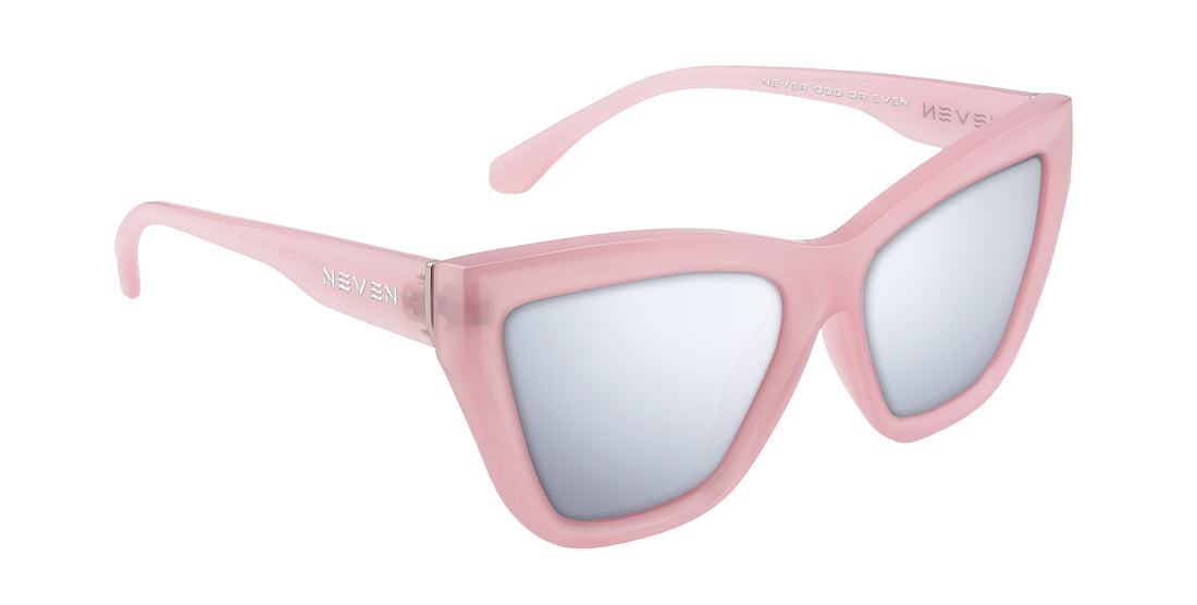 Three-quarter view of Eclipse sunglasses with pink semi-transparent cat-eye frames and mirrored prescription lenses on white