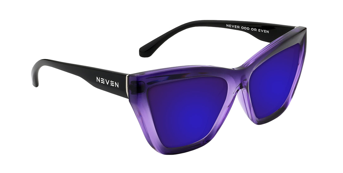 Three-quarter close-up of Ethereal prescription cat-eye sunglasses with glossy purple gradient frames and blue lenses