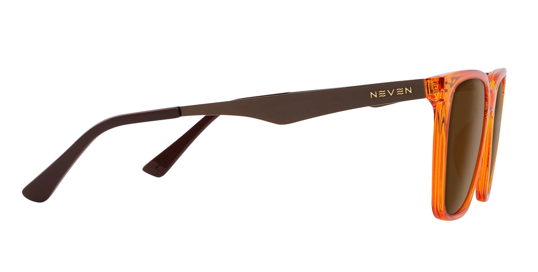 Close-up side view of Java prescription sunglasses showcasing orange amber transparent frame and bronze metallic temple with Neven logo on white background