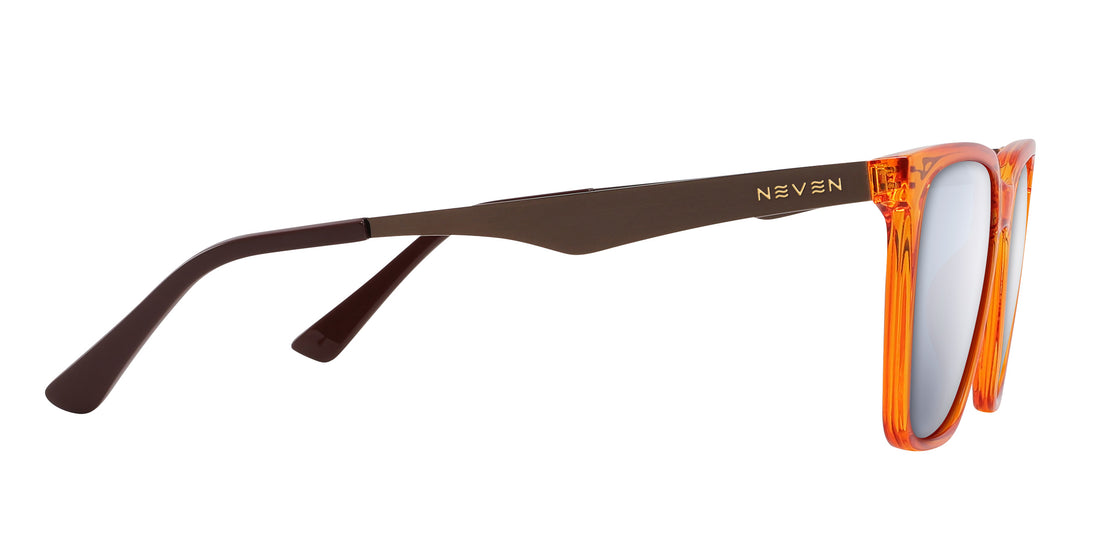 Close-up side view of Java sunglasses showcasing orange-amber transparent frame and bronze metal temple on white background