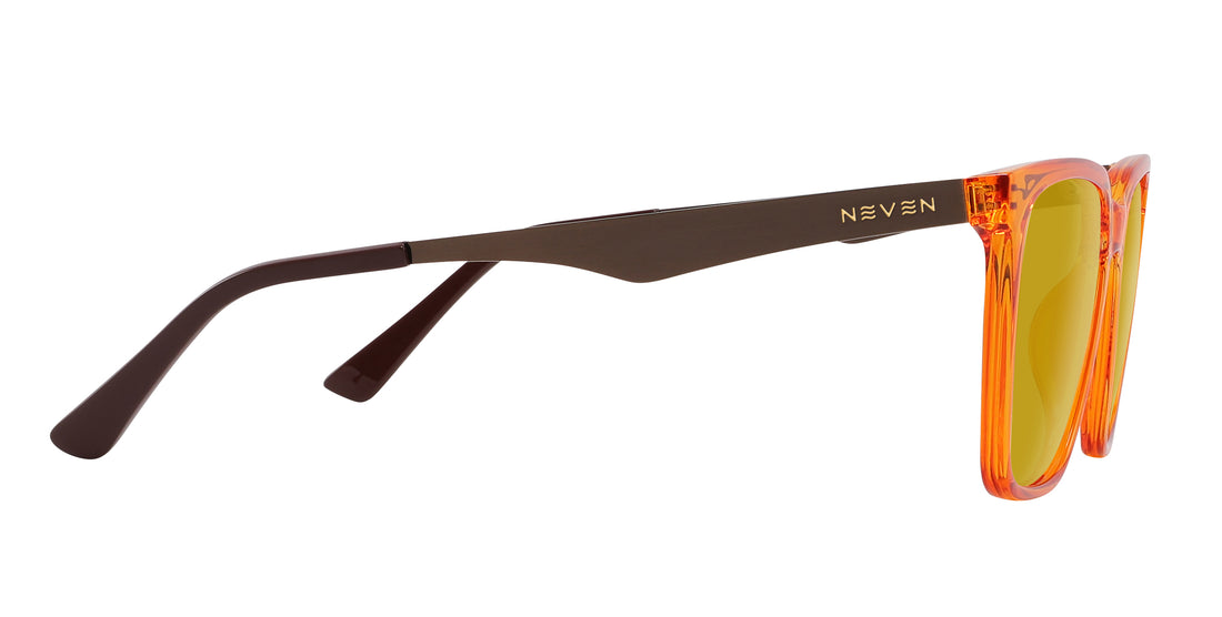 Close-up side view of Java prescription sunglasses showcasing bronze metallic temples and orange amber transparent frames on white background