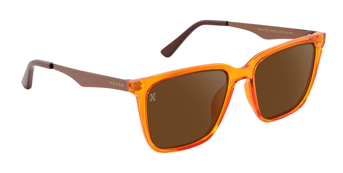 Three-quarter view of Java sunglasses with transparent orange frames, brown polarized lenses, and bronze temples on white background