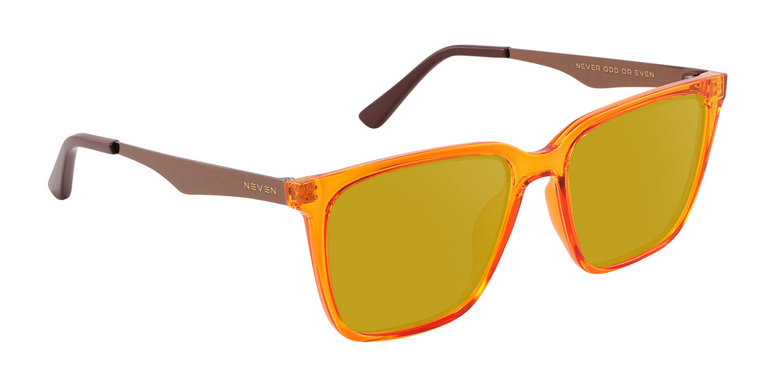 Close-up three-quarter view of Java prescription sunglasses showing orange-amber transparent frames and bronze metal temples on white background