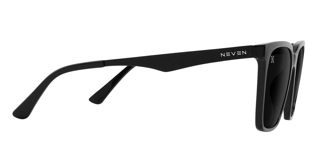 Close-up side view of Mamba sunglasses showing glossy black rectangular frame, matte black metal temples, and Neven logo on white background