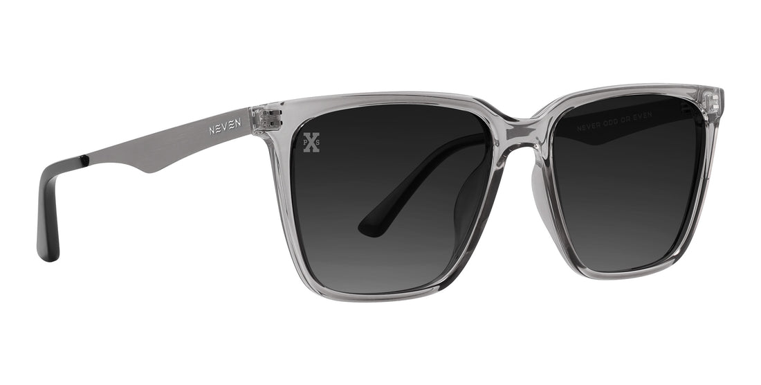 Angled front view of Tornado polarized sunglasses with translucent gray rectangular frame and dark lenses on white background