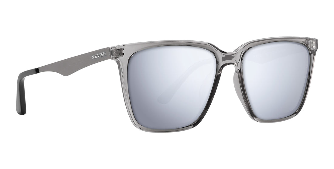 Three-quarter view of Tornado prescription sunglasses showcasing transparent gray frames and silver metallic temples with a white background