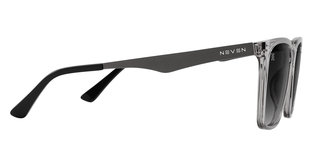 Side view of Tornado sunglasses showcasing transparent gray frames and silver metal temples with gray polarized lenses on white background
