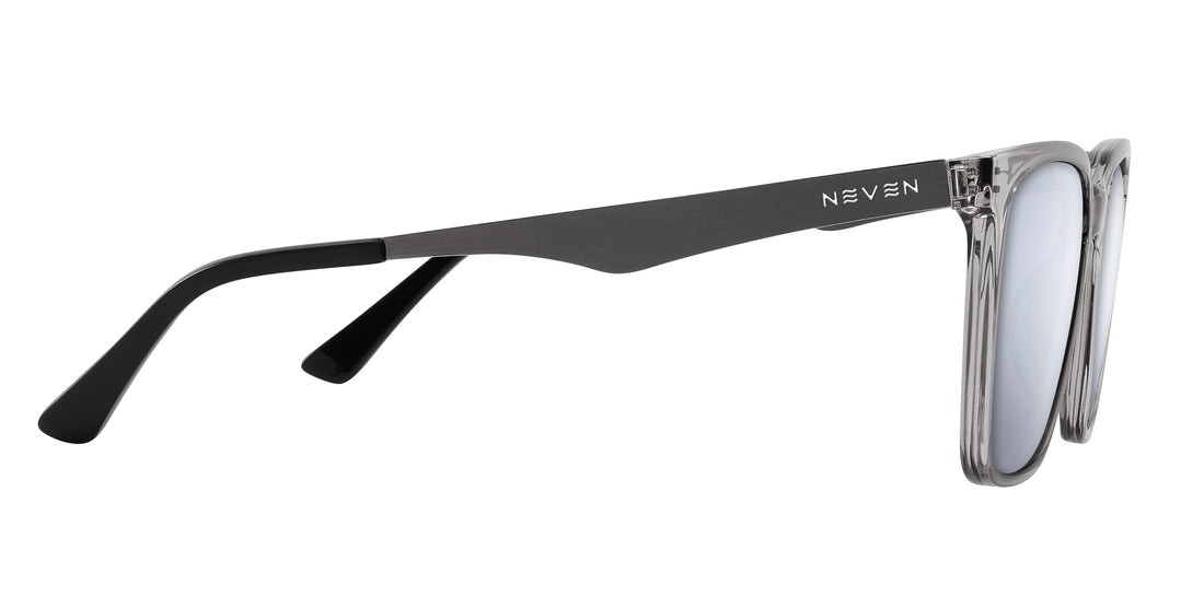 Side view of Tornado prescription sunglasses showcasing transparent gray frames and silver metallic temples on white background