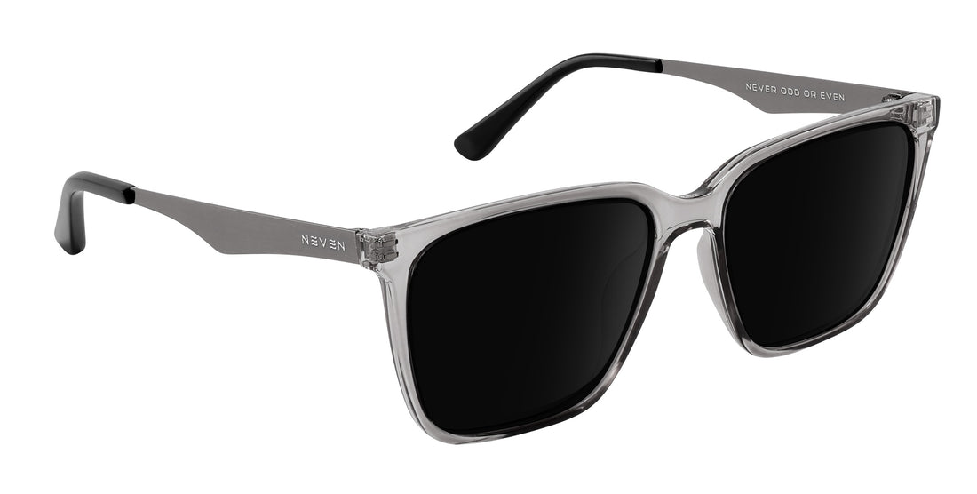 Three-quarter view of Tornado prescription sunglasses showcasing transparent gray frames and black lenses with white background