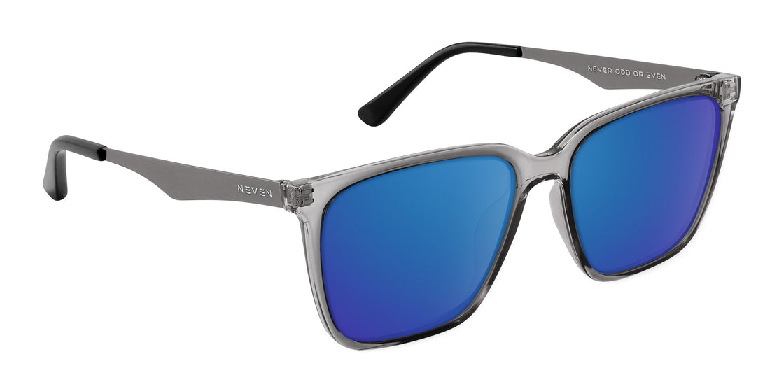 Three-quarter view of Tornado prescription sunglasses showcasing blue lenses, transparent gray frames, and silver metal temples on white background