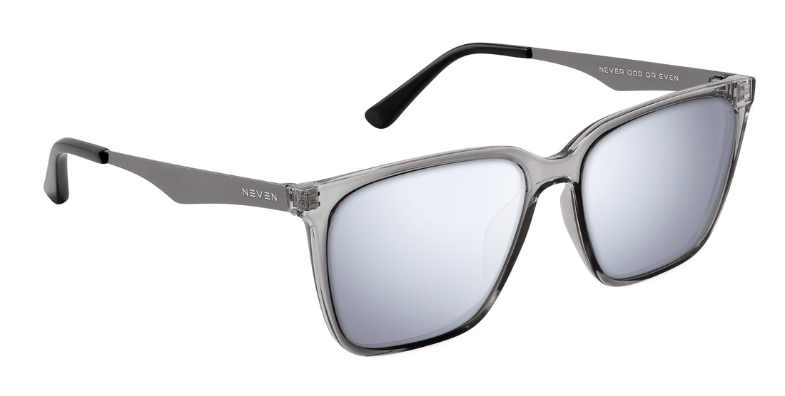Three-quarter view of Tornado prescription sunglasses showcasing transparent gray frames and silver metallic temples on white background