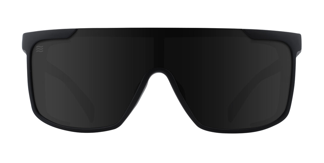 Front view of Night Watch polarized sunglasses showcasing a black frame and shield lens on a white background