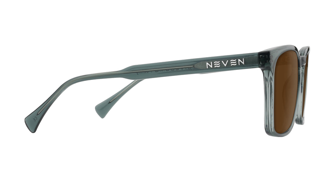 Side view of Lenny prescription sunglasses with transparent glossy gray frames and brown lenses on white background