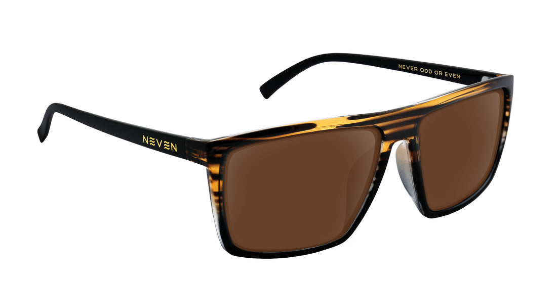 Angled close up of Asbury XL sunglasses showing larger fit black wood grain frame and brown Rx lenses on white background