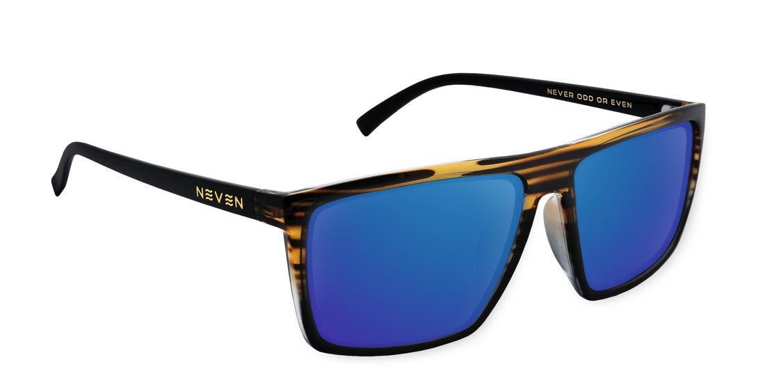 Angled close-up of Asbury XL sunglasses showing glossy tortoiseshell frame and blue mirrored prescription lenses on white background
