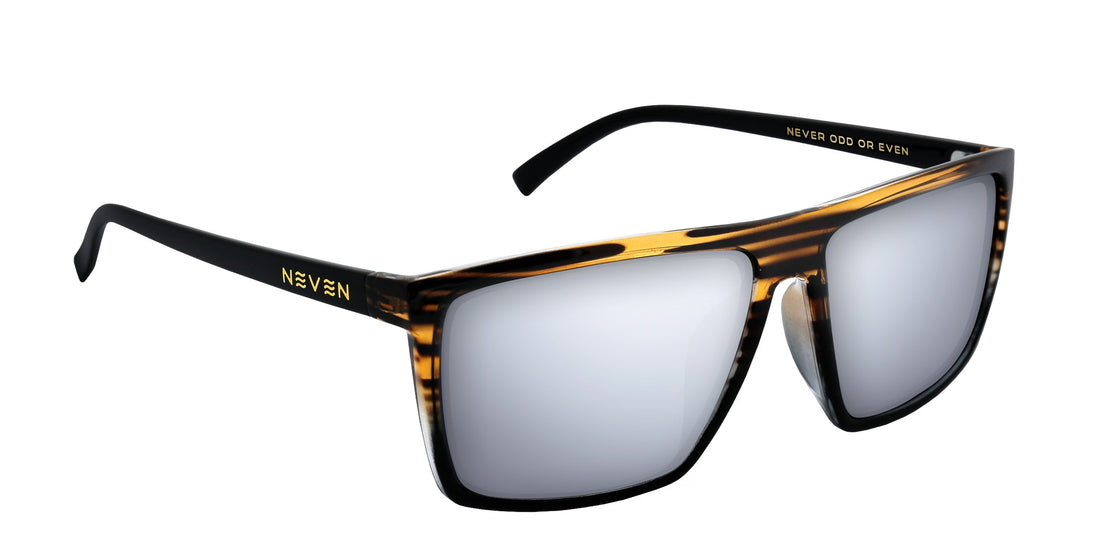 Three-quarter close-up of Asbury XL sunglasses showing glossy black wood-grain XL frame and silver mirrored prescription lenses on white background