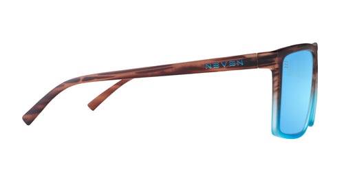 Side view of Melby XL sunglasses with brown tortoiseshell temple, turquoise front and blue mirrored lens on white background