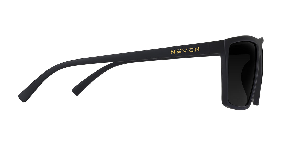 Side view of Norton XL prescription sunglasses showcasing black frame, dark lenses, and gold Neven logo on a white background