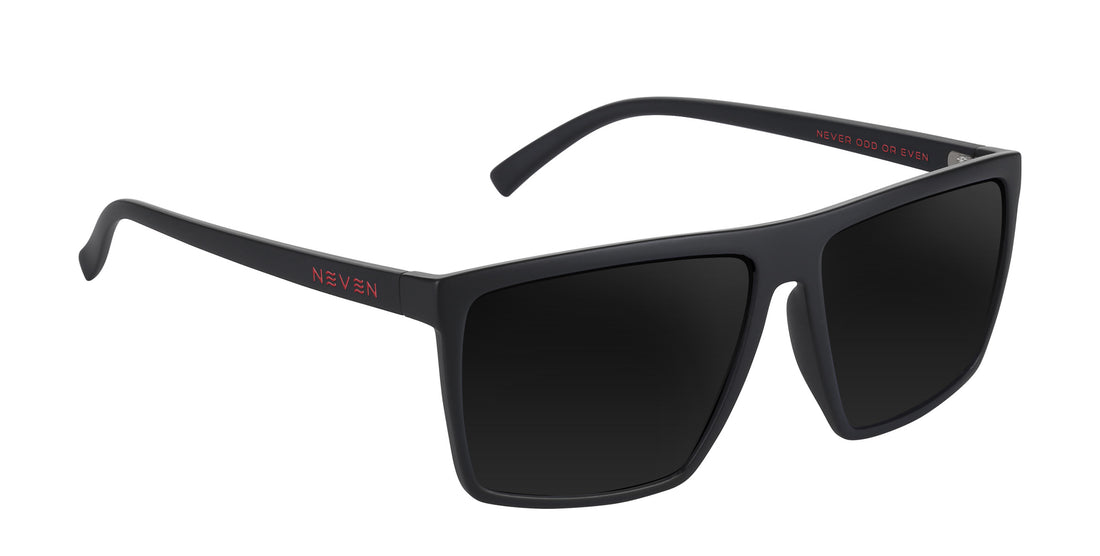 Three-quarter close-up of 212 prescription sunglasses showing a matte black large rectangular frame and red Neven logo on the temple on white background