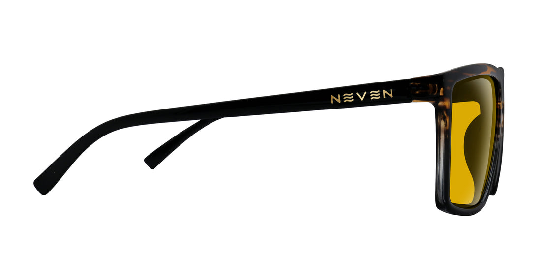 Side view of Asbury prescription sunglasses showcasing black glossy temple with gold NEVEN logo and yellow lenses on white background