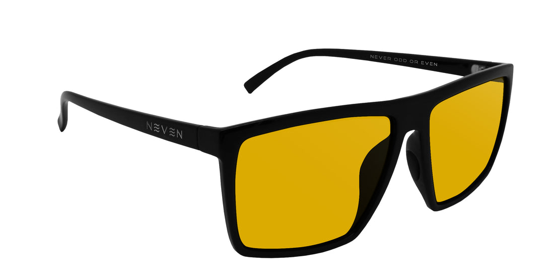 Three-quarter view of NYC Rx prescription sunglasses showcasing large gloss black frame and yellow lenses on white background