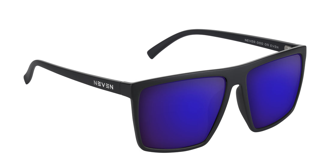 Angled close-up of Three Of Cups prescription sunglasses showcasing matte black rectangular frame and mirrored purple-blue lenses on white background