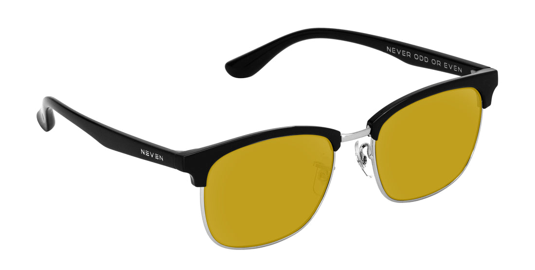 Angled close-up of Bullet prescription sunglasses showing yellow lenses and black browline TR90 frame on white background
